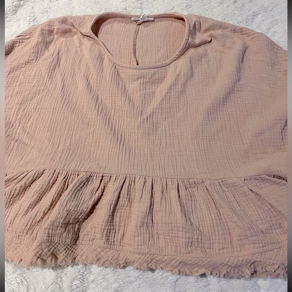 Cropped peplum style top